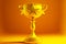 shiny star on golden cup pedestal on yellow background