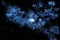 Shiny starlit sky illustration with heavy blue clouds and stars