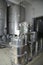 Shiny tank or barrel at a beer and wine factory. Industry Brewing and winemaking. Equipment .