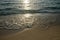 Shiny tropic sea wave on golden beach sand in sunset light,lipe