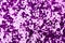 Shiny violet holographic glitter background, your elegant texture for holiday design.