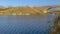 Shiny water and arched bridge in Oquirrh Lake