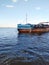 Ship barge Volga river embankment blue water sky summer nature photo