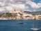 Ship, coastline and blue sky