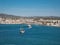 Ship, coastline and blue sky