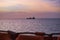 Ship crosses river Gambia at sunrise
