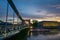 Ship excursion under beautiful bridge during sunset, Wroclaw