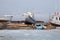 Ship and fisher boats on the dock in Large Goloustnoye Village. Baikal Lake