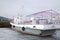 Ship and fisher boats on the dock in Large Goloustnoye Village. Baikal Lake