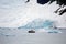 Ship in front of glacier in Antarctica