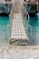 Ship gangway on the sandy beach