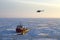 Ship and helicopter in the Arctic