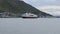 The ship hurtigruten entering tromsoe harbour