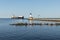 A Ship And A Lighthouse On Lake Superior