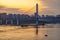 Ship and Lijiatuo Yangtze River Bridge at sunset