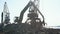 Ship loader scrap in harbor,Freight train, ship and scrap metal in port