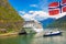 Ship in the marina of Flam with flag of Norway