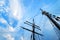 Ship masts rigging, blue sky