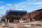 Ship and monumental crane in the shipyard