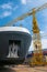 Ship and monumental crane in the shipyard