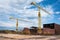 Ship and monumental crane in the shipyard