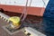 Ship mooring rope moored on the bollard. Moored boat in the port