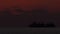 the ship at night in the wavering fog on the horizon at a strong zoom of 1200mm