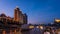 Ship passengers looking at Chongqing city at sunset