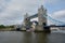 A ship passing underneath the Tower Bridge