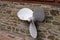 Ship propeller on a brick wall - Isolated helix