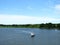 Ship in river Atmata in summer, Lithuania