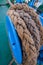 Ship shabby wicker thick rope wound on an iron hook.