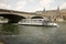 Ship with tourists sailing on the Seine on a study tour of Paris