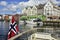 Ship and typical old buildings in Bryggen district in Bergen, a beautiful city in Norway