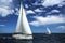 Ship yachts with white sails in the open sea. Sailing. Yachting