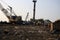Shipbreaking Yard in Darukhana, Mumbai, India â€“ INS Vikrant dismantling with scrap metal & workers in background