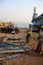 Shipbreaking Yard in Darukhana, Mumbai, India â€“ INS Vikrant dismantling with scrap metal & workers in background