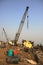 Shipbreaking Yard in Darukhana, Mumbai, India â€“ INS Vikrant dismantling with scrap metal & workers in background