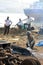 Shipbreaking Yard in Darukhana, Mumbai, India â€“ INS Vikrant dismantling with scrap metal & workers in background