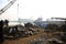 Shipbreaking Yard in Darukhana, Mumbai, India â€“ INS Vikrant dismantling with scrap metal & workers in background