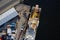 Shipbuilding aerial view at shipyard harbour with ship in construction with scaffold uk