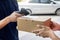 Shipment working delivery service concept, Messenger Leaving Parcel Barcode Scanning checking order to confirm before sending