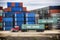 Shipping containers loading on truck