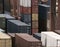 Shipping Containers Stacked At Busy Cargo Port