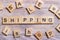 Shipping Word Written In Wooden Cube. Wooden Cube background