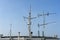 Ships antenna and navigation system on a ferry boat with sunlight and blue sky in background, Thailand