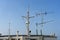 Ships antenna and navigation system on a ferry boat with sunlight and blue sky in background, Thailand