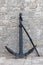 Ships\' black painted anchor set on display