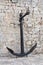 Ships\' black painted anchor set on display