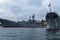 Ships of the Russian Navy anchored in the port of Sevastopol. The gray sky in the background.